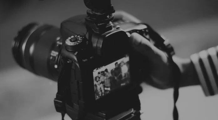 Person Holding Black Dslr Camera for gallery