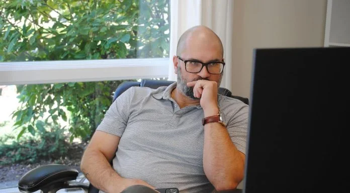 Corporate leader looking at the computer