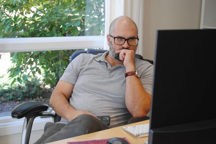 Corporate leader looking at the computer