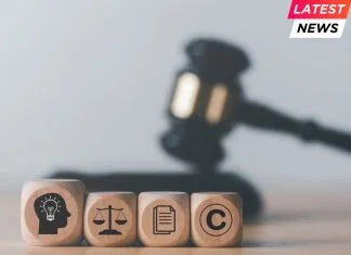 Anthropic to Pay $1.5 Billion in Author Copyright Case Author-copyright wooden blocks