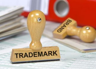 The Role of Trademark Registration in Building a Strong Startup Brand trademark printed on rubber stamp