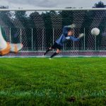 Club - Anonymous Soccer Player Kicks Ball on Penalty