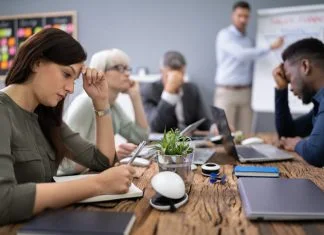 Six Red Flags Your Team is Unhappy and How to Fix Them Fast Unhappy team during the meeting