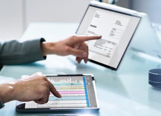 Electronic Invoice Spreadsheet Software, OCR and Corporate Invoice On Computer