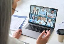 Remote teams having a videocall on financial report using laptop