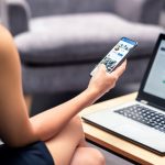 Facebook profile page in smartphone screen at work.