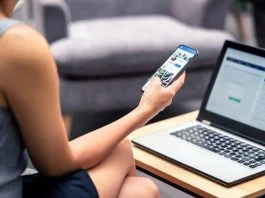 Why Your Facebook Posts Aren’t Getting the Likes Facebook profile page in smartphone screen at work.