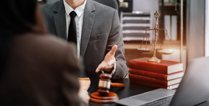 Chris Randle, Attorney giving advice to the client