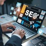 SEO text with magnifying glass and laptop, illustrating search engine optimization, web traffic analytics, keyword ranking, and online visibility improvement