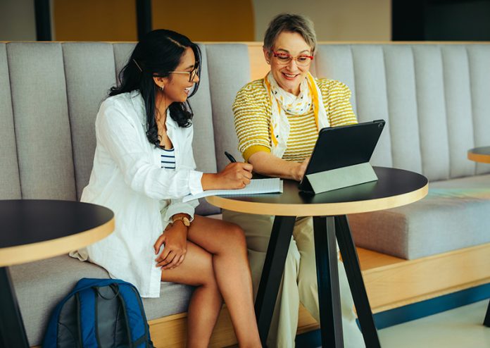 Tutor and student studying together using a digital tablet in a modern learning environment From Persuasion to Deal: Negotiating Conflicts