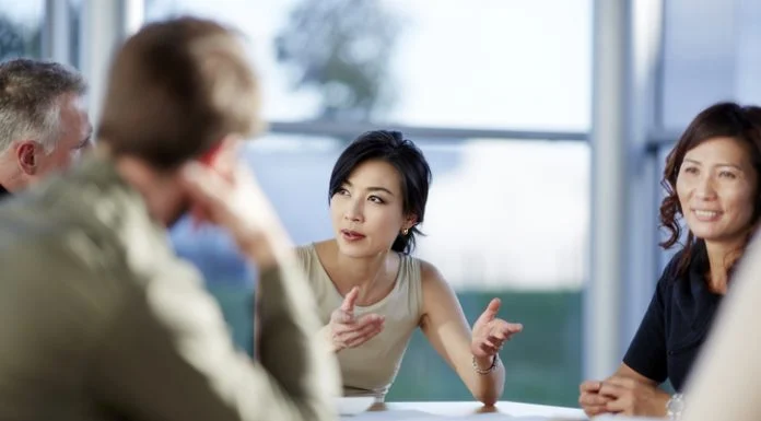 Sayaka Ohshima on How Policy is Rewriting the U.S.–Japan Business Equation Japanese businesswoman having a meeting with U.S investors