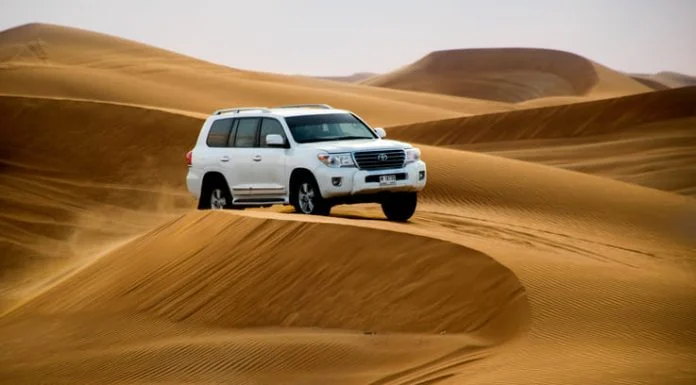 Dubai’s Dunes, Britain’s Deals: Business Without Borders on Four Wheels Car rental in dubai