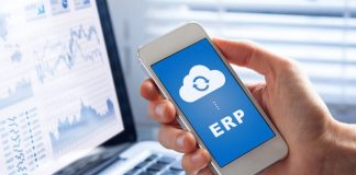 BCIT Launches Prague Workshop to Guide Businesses Through the Cloud ERP Transition ERP app on smartphone screen connecting data with cloud computing