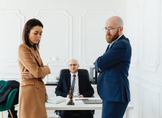 Property Settlement After Divorce: How Assets Are Divided in Australia Property - Sad Couple with their Divorce Lawyer