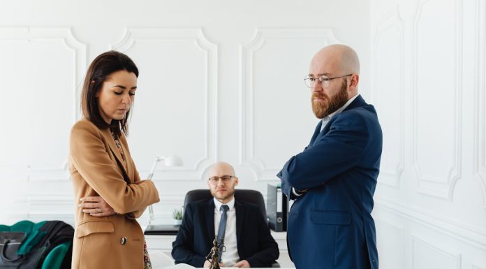 Property Settlement After Divorce: How Assets Are Divided in Australia Property - Sad Couple with their Divorce Lawyer