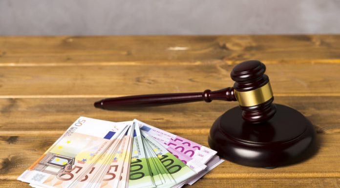What to Consider Before Applying for a Lawsuit Loan gavel with euro bank notes for Lawsuit Loan