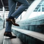 5 Ways Courage Helps Unlock Your Potential Businessman taking a step on stair with courage