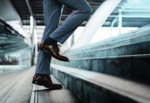 5 Ways Courage Helps Unlock Your Potential Businessman taking a step on stair with courage