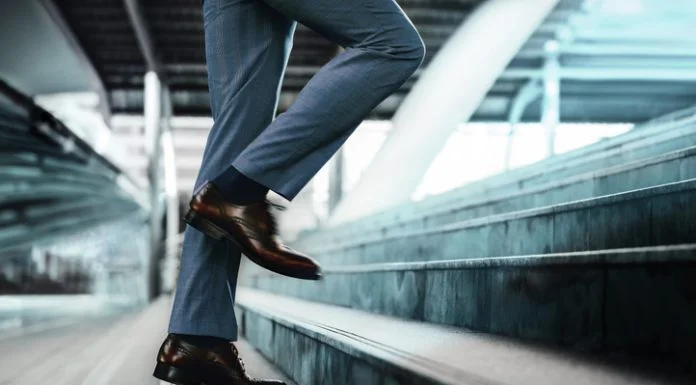 5 Ways Courage Helps Unlock Your Potential Businessman taking a step on stair with courage