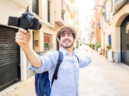 What’s Trending and What’s Fading: 2026 Travel Marketing Shifts You Should Know Ahead of Time Travel - Young tourist man streaming