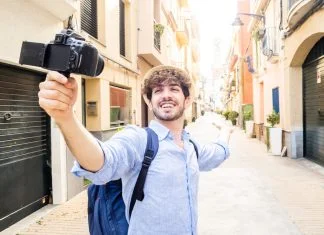 What’s Trending and What’s Fading: 2026 Travel Marketing Shifts You Should Know Ahead of Time Travel - Young tourist man streaming