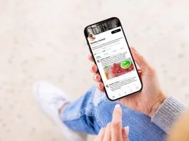 Woman viewing wellness lifestyle advice on creator's profile page on social media app