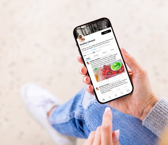 Wellness Gone Viral: Why Health Advice Needs a Fact Check Woman viewing wellness lifestyle advice on creator's profile page on social media app