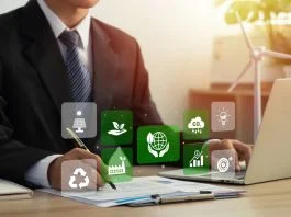 Businessman analyze sustainability investment and signing a green business contract.