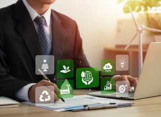 Businessman analyze sustainability investment and signing a green business contract.