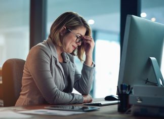 Businesswoman managing small business feeling burnout and tired