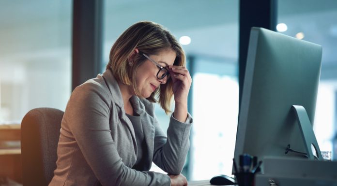 Scaling You: How Small Business Owners Can Grow Without Burning Out Businesswoman managing small business feeling burnout and tired