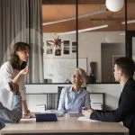 Clarity is the Catalyst: How HR Leaders Can Drive Engagement and Performance HR leader engaging with other employees