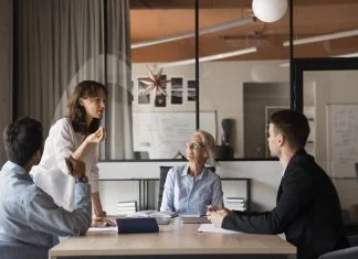 Clarity is the Catalyst: How HR Leaders Can Drive Engagement and Performance HR leader engaging with other employees