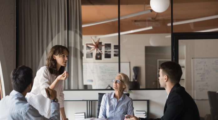 Clarity is the Catalyst: How HR Leaders Can Drive Engagement and Performance HR leader engaging with other employees