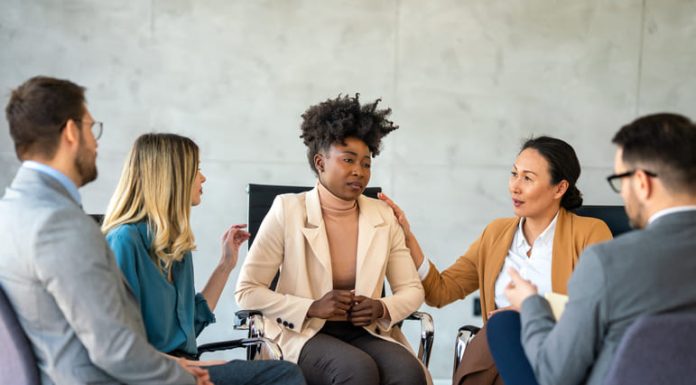 Putting Wellbeing at the Heart of Leadership – Expert Insights for World Mental Health Day Support with group, therapy and mental health with help, people together talking about problem