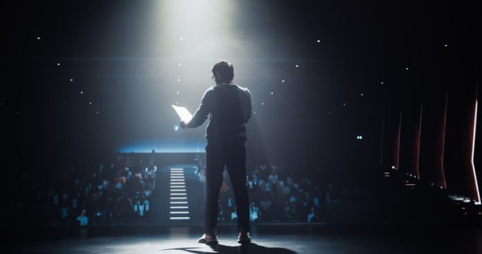 Business man afraid of public speaking. Glossophobia concept