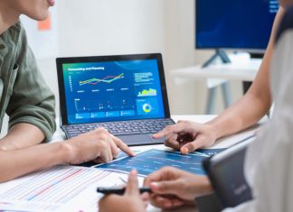 analyzing digital financial data and strategy in a modern office for quarterly report