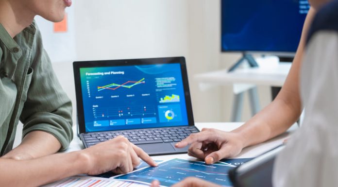 Forecasting the Future Enterprise Beyond Quarterly Reports analyzing digital financial data and strategy in a modern office for quarterly report