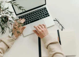 student using computer for her education