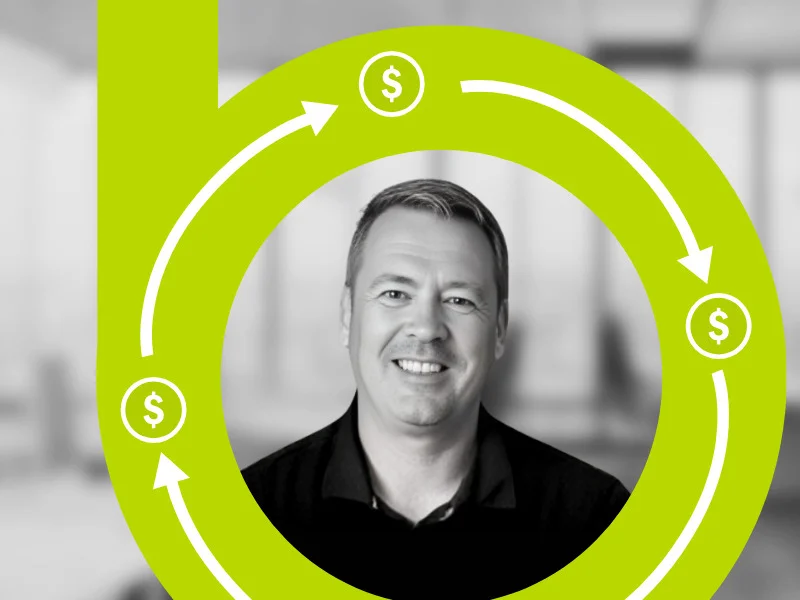 Business professional framed in a rotating dollar-cycle graphic symbolising NZ’s 2026 seller’s market. 