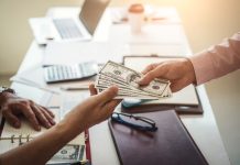 Instant Cash Loans: Your Simple Guide to Fast Financial Help Hand of business man giving money for cash loans