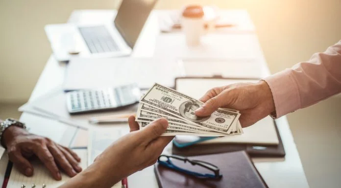 Instant Cash Loans: Your Simple Guide to Fast Financial Help Hand of business man giving money for cash loans