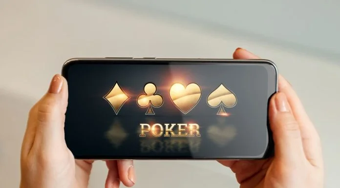 From Licensing to Payouts: Key Factors That Define a Reliable Online Casino in Malaysia Malaysia - smartphone with playing cards