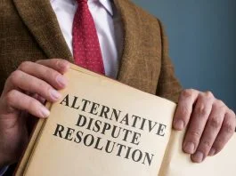 lawyer holding Alternative Dispute Resolution