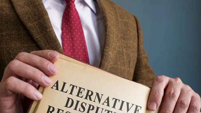 Alternative Dispute Resolution (ADR): A Comprehensive Guide lawyer holding Alternative Dispute Resolution
