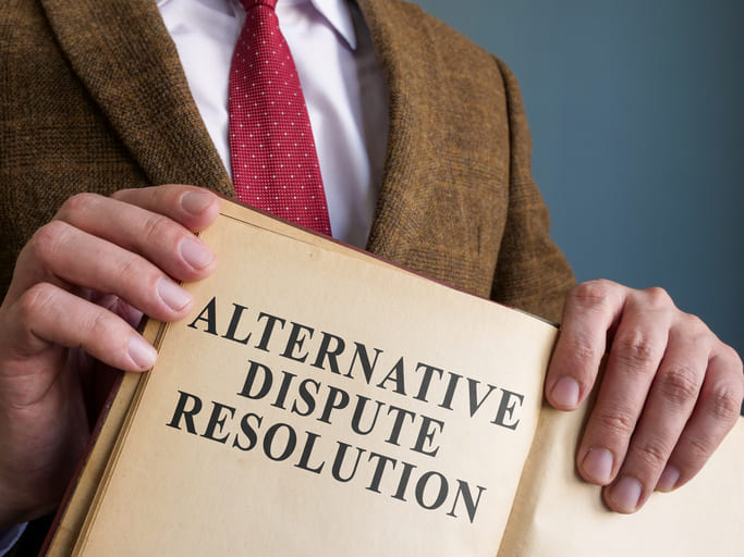 iStock-1357648478 (1) lawyer holding Alternative Dispute Resolution