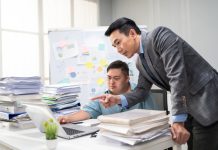 Employee man with autism or AuDHD at Work brainstorm plan and discuss project with manager leader. Corporate of modern colleague