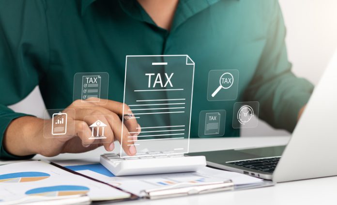 Corporate and individual tax payment concept, Businessman filing taxes on laptop financial planning and Corporate tax, Income tax return and VAT calculation government revenue and taxation concept. Why You Should Align Tax Incentives with Your Business Strategy