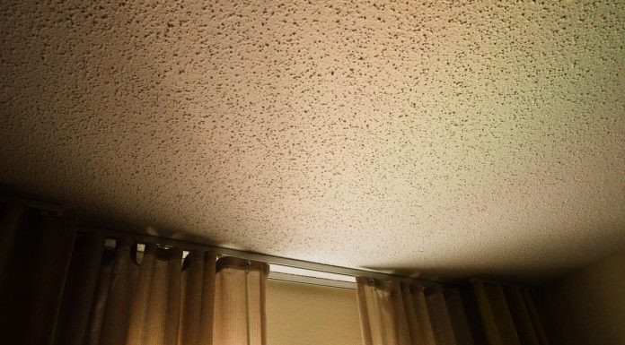 The Power of Acoustic Spray for Optimal Sound Absorption Acoustic - textured ceiling