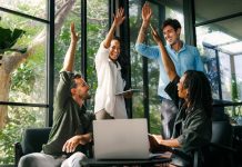 Diverse team celebrating their success and the great work environment